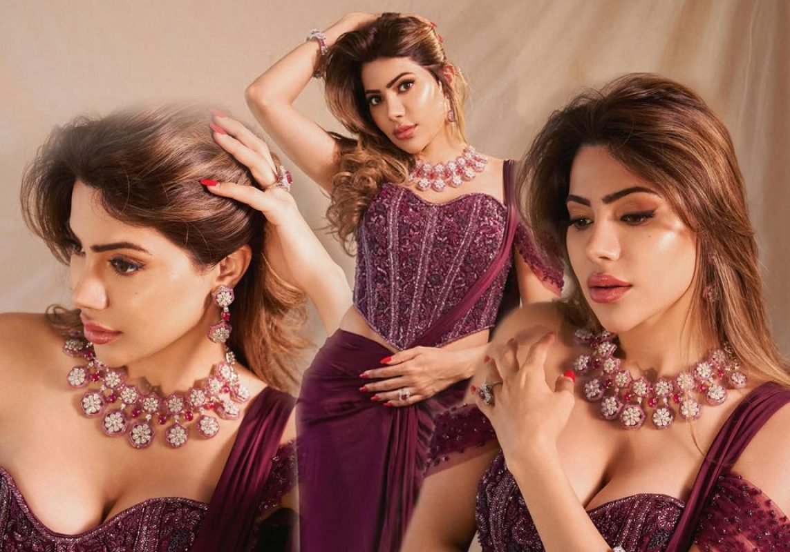 Nikki Tamboli Stuns in a Regal Plum Ensemble, Redefining Modern Glamour