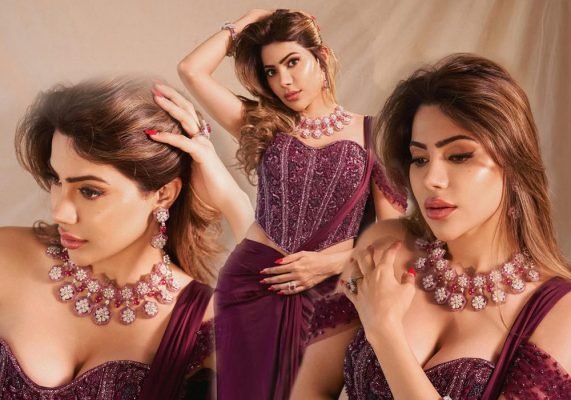 Nikki Tamboli Stuns in a Regal Plum Ensemble, Redefining Modern Glamour
