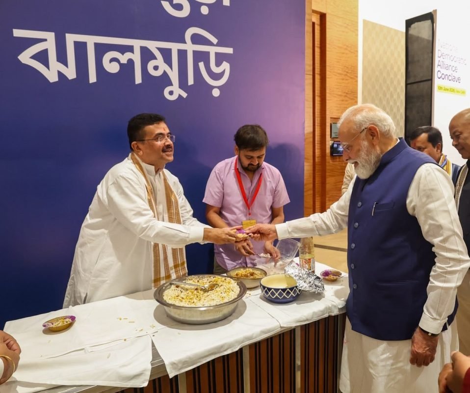 Suvendu Adhikari Serves Jhalmuri to PM Modi at NDA Conclave Celebrating Historic Tenure Milestone