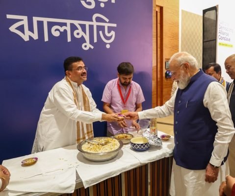 Suvendu Adhikari Serves Jhalmuri to PM Modi at NDA Conclave Celebrating Historic Tenure Milestone