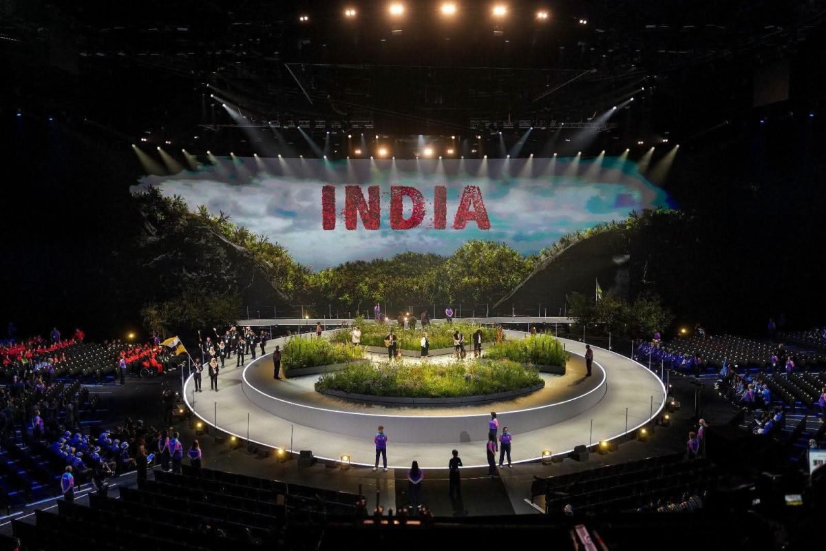 King Charles III declares the 2026 Commonwealth Games open during the opening ceremony at Glasgow's OVO Hydro as athletes from participating nations celebrate.
