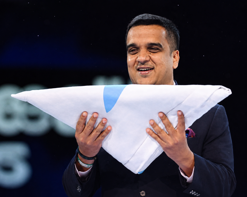 Gujarat Deputy Chief Minister Harsh Sanghavi addresses the audience during the Glasgow 2026 Commonwealth Games closing ceremony, affirming Ahmedabad's readiness to host the 2030 Games.