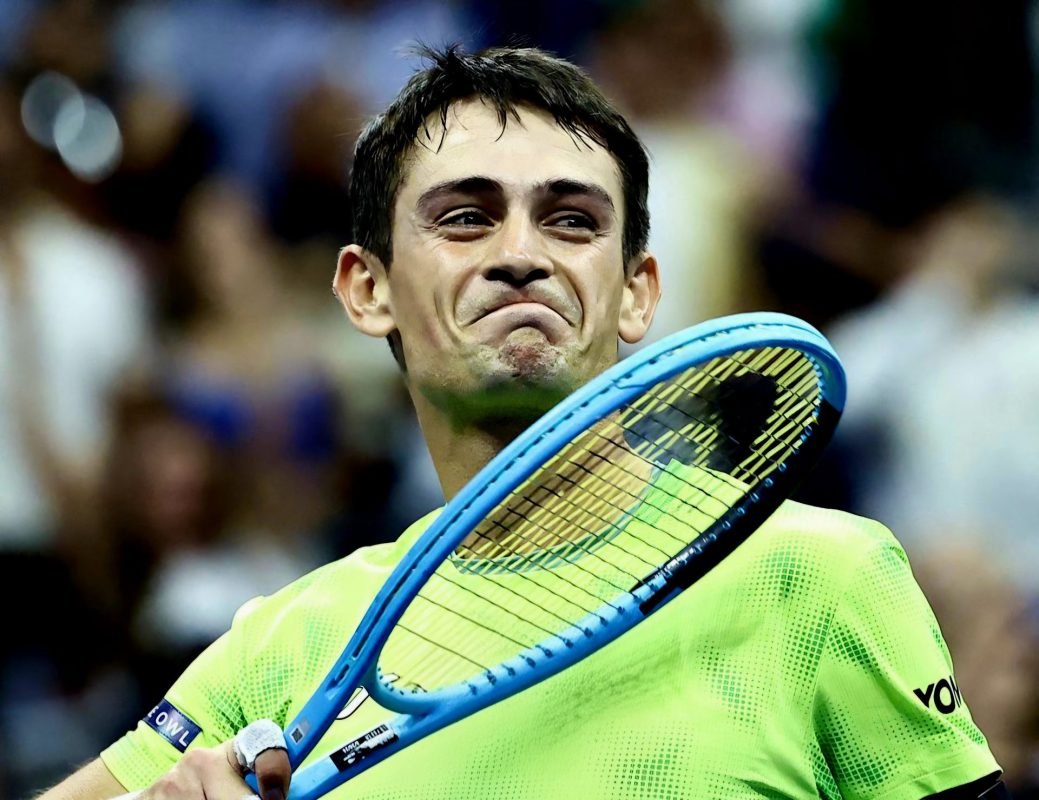 Mariano Navone celebrates after defeating Novak Djokovic in the first round of the 2026 US Open at Arthur Ashe Stadium