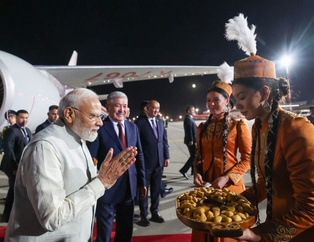 Prime Minister Narendra Modi received by Kyrgyzstan officials upon arrival in Bishkek for the 26th SCO Leadership Summit.