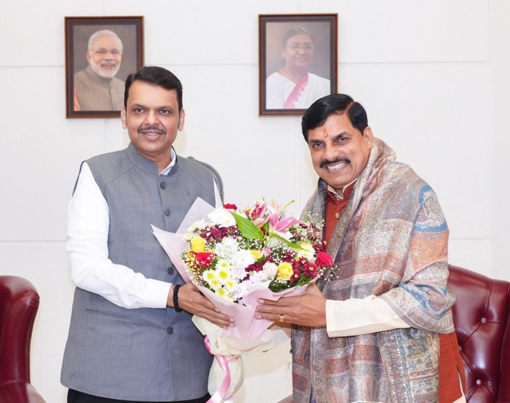 Maharashtra Chief Minister Devendra Fadnavis welcomes Madhya Pradesh Chief Minister Dr. Mohan Yadav at Varsha Bungalow in Mumbai.