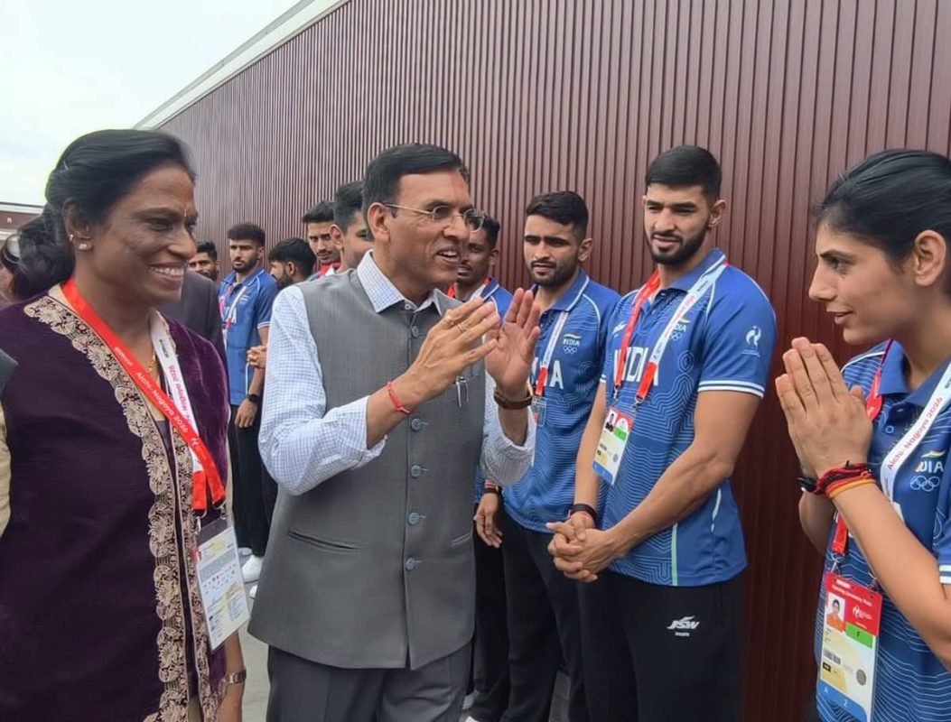 Mansukh Mandaviya, P.T. Usha and Nagma Mohamed Mallick interact with Team India athletes at the Athletes’ Plaza in Japan.