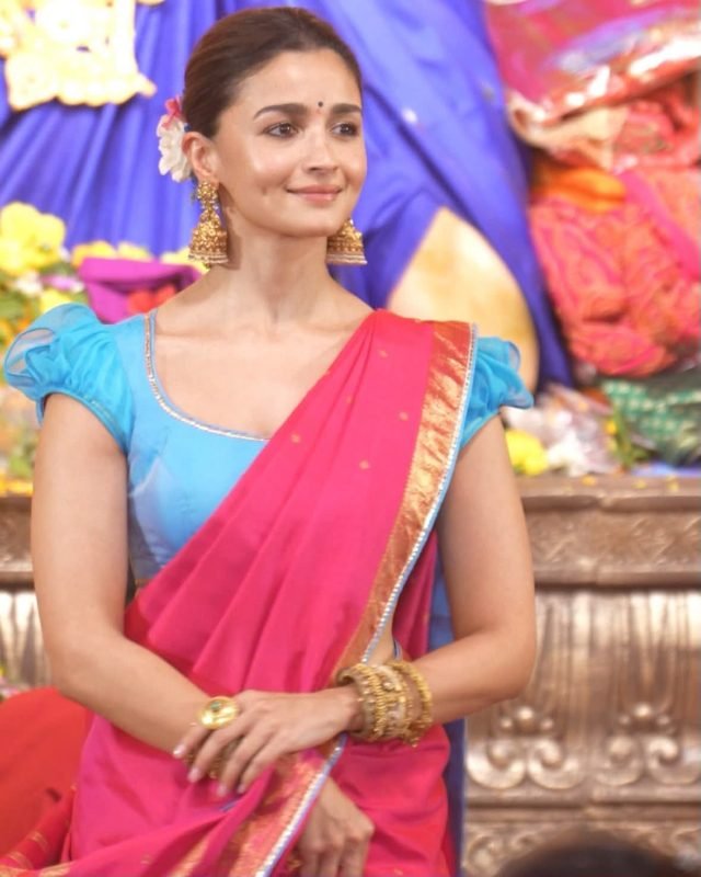 Festive royalty: Stunning grace! 🌺👑